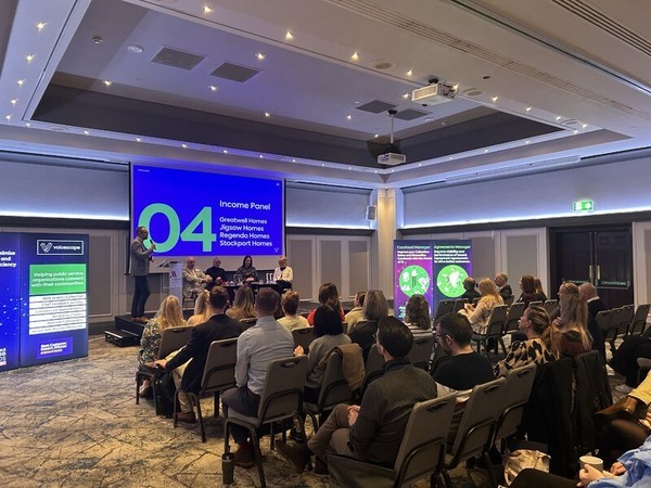 Attendees in a conference hall for Voicescape's Customer Conference